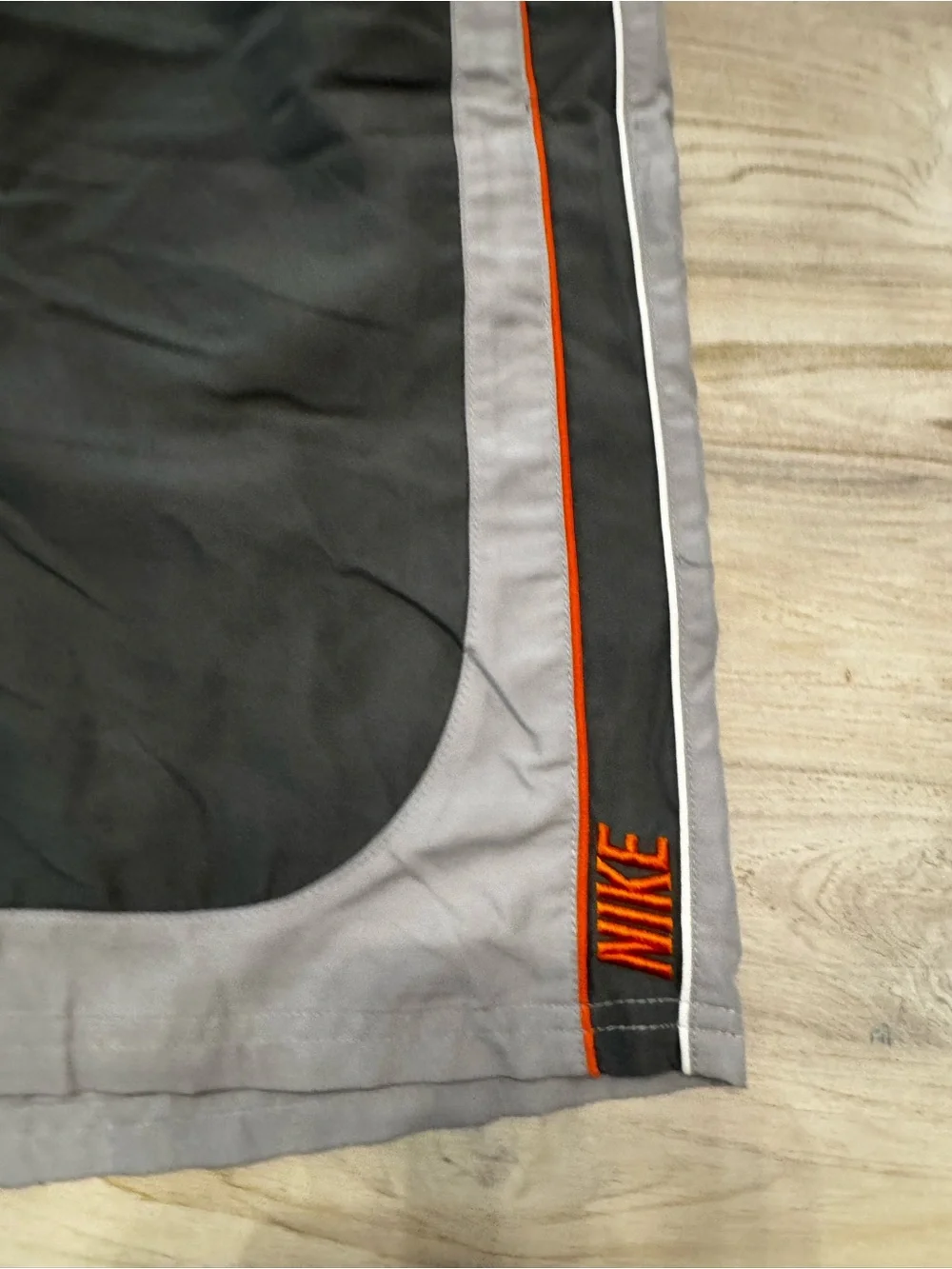 Nike Men's Y2K Black and Gray Athletic Swim Shorts with Orange Trim